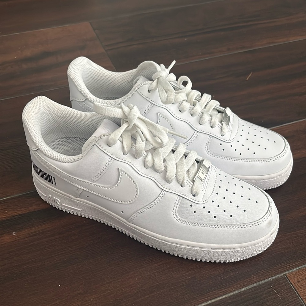 Never worn Nike Air Force ones with logo